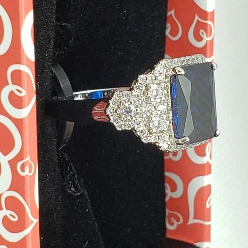 Brand New 18k White Gold Plated ring with cubic zirconia stones & blue gemstone